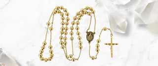 Unlocking the Spiritual Significance and Elegance of Gold Rosaries  - Amalia J & Boutique