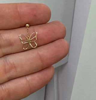 18K Solid Yellow Gold Dangle Open Butterfly Post Earrings in a hand