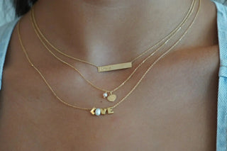 18K Yellow Gold Love Necklace with O Cultivated  Pearl 16 inches with extra ring at 15 inches