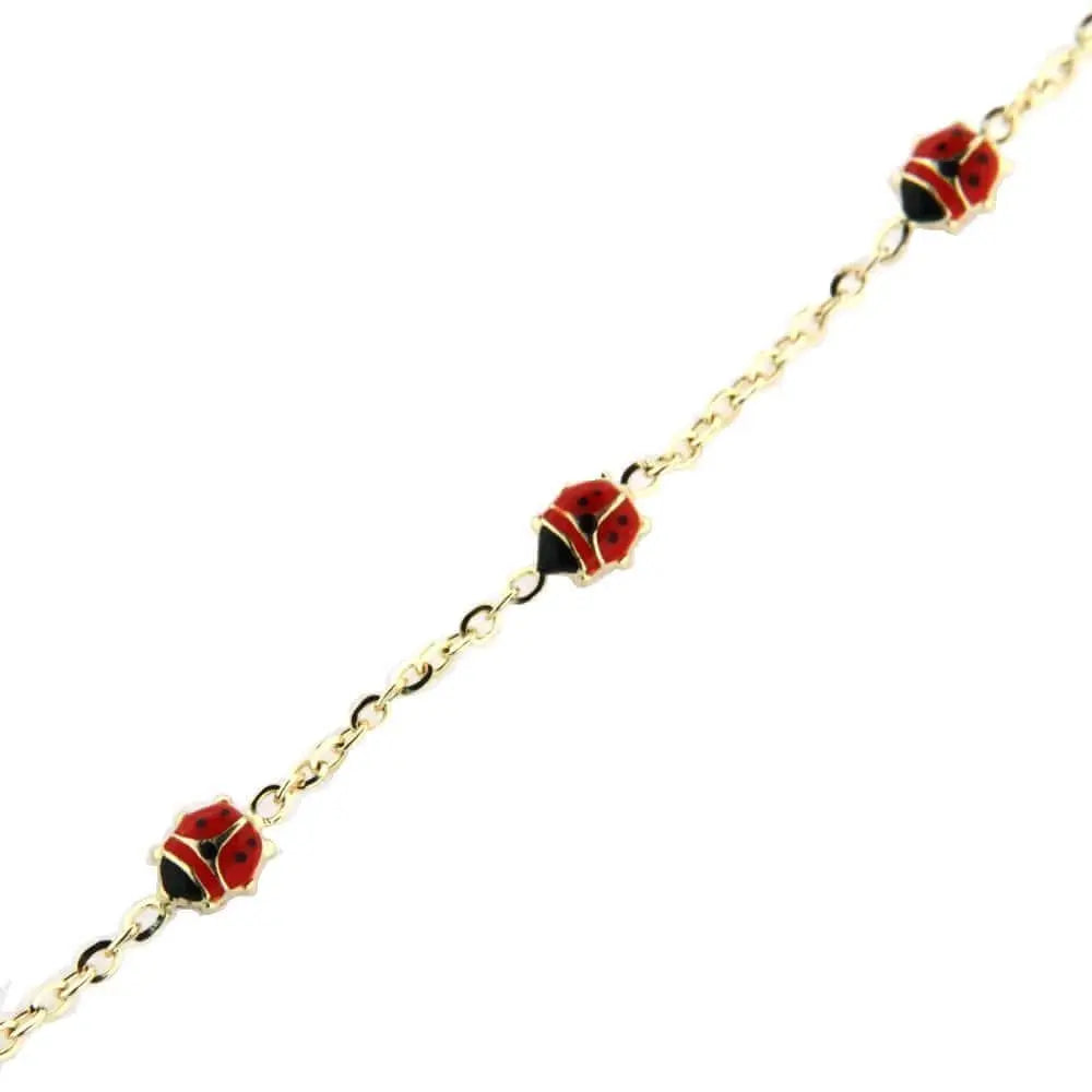 18 kt yellow gold charm bracelet with heart,ladybird beetle,bear,water